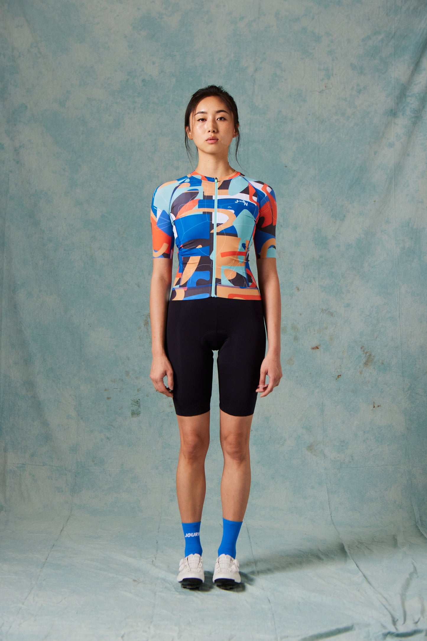 WOMEN'S MOMENTUM JERSEY ARTIST SERIES | LOGO