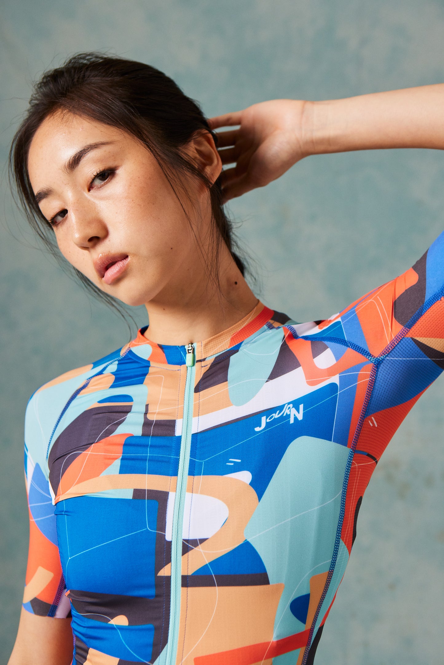 WOMEN'S MOMENTUM JERSEY ARTIST SERIES | LOGO